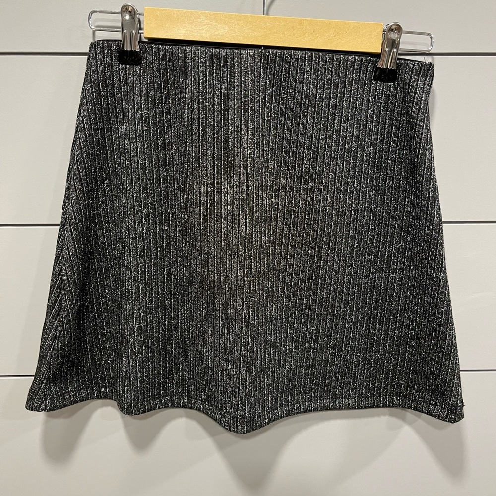 Urban Outfitters black and silver mini skirt. Size M